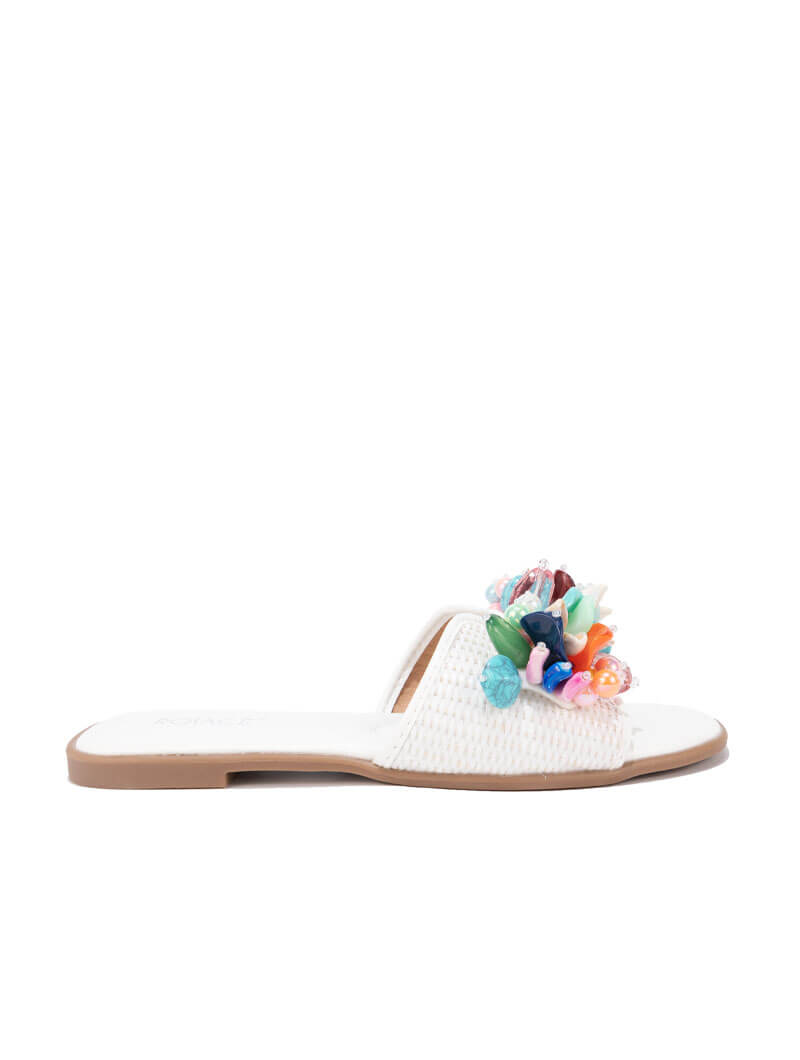 Mules plates avec accessoire